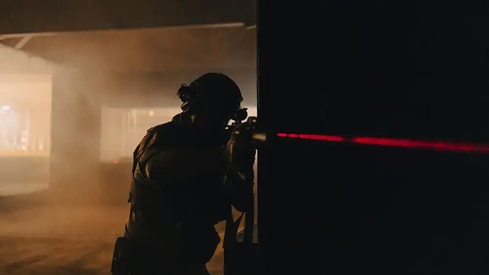 Top ranked tactical player aiming down sights